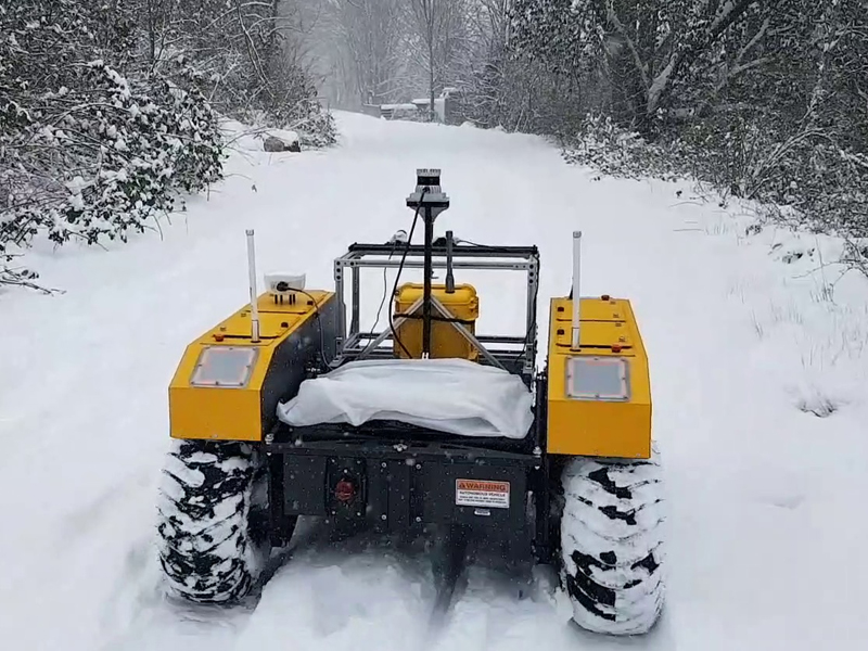group-lab_robot-learning-lab Robot Learning lab cover photo of robotic warthog/all terrain vehicle driving in the snow