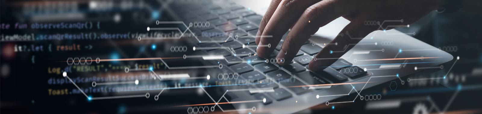 Header concept image for Software & Hardware Systems featuring hands typing on a keyboard with code and symbols overlayed