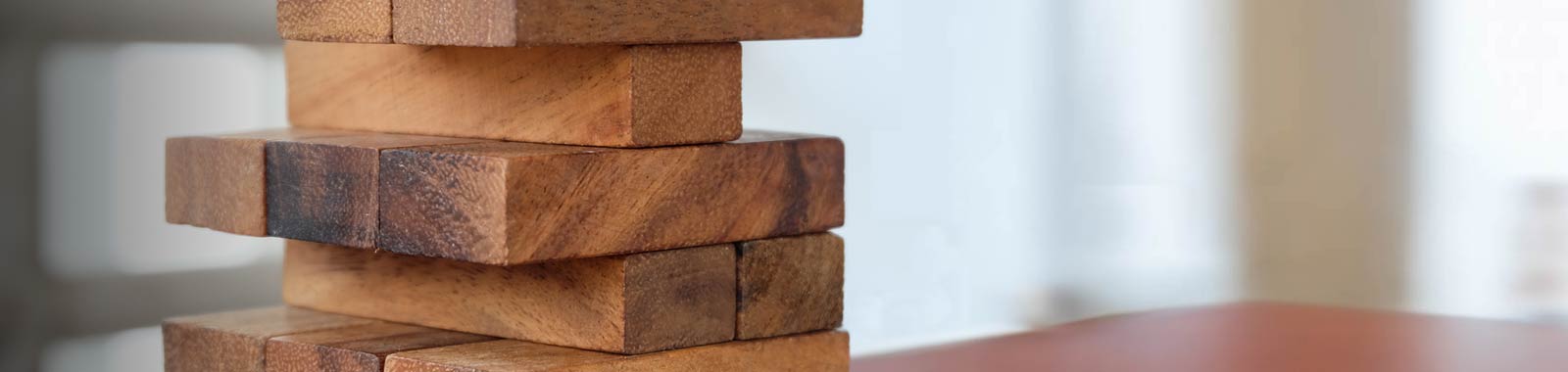 Header for Theory & Models of Computation featuring wooden puzzle blocks stacked together.
