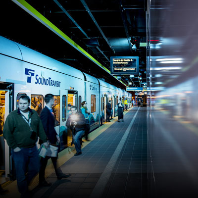 Passengers getting off the Link Lightrail train.