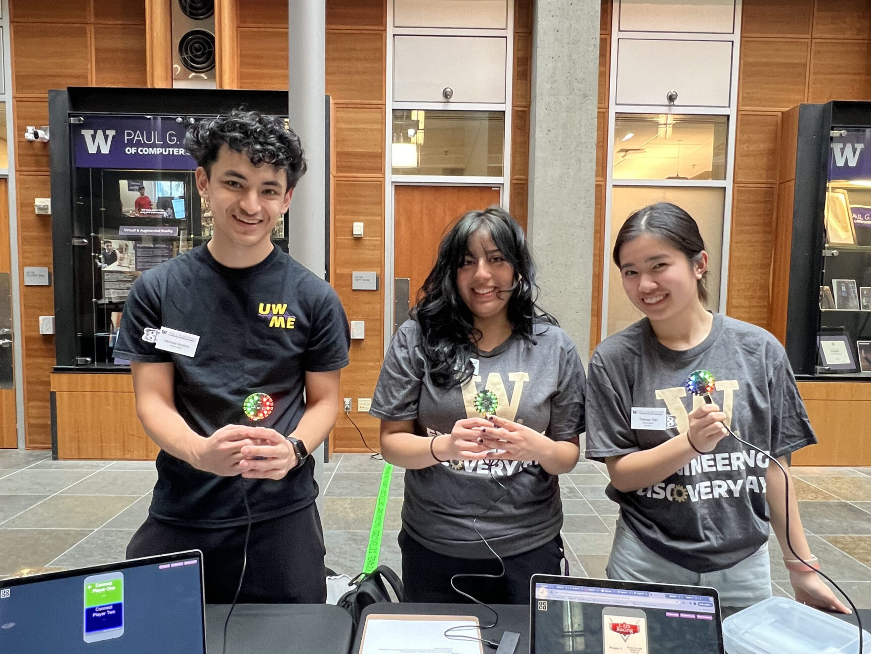 3 Allen School Ambassadors tabling at an outreach event