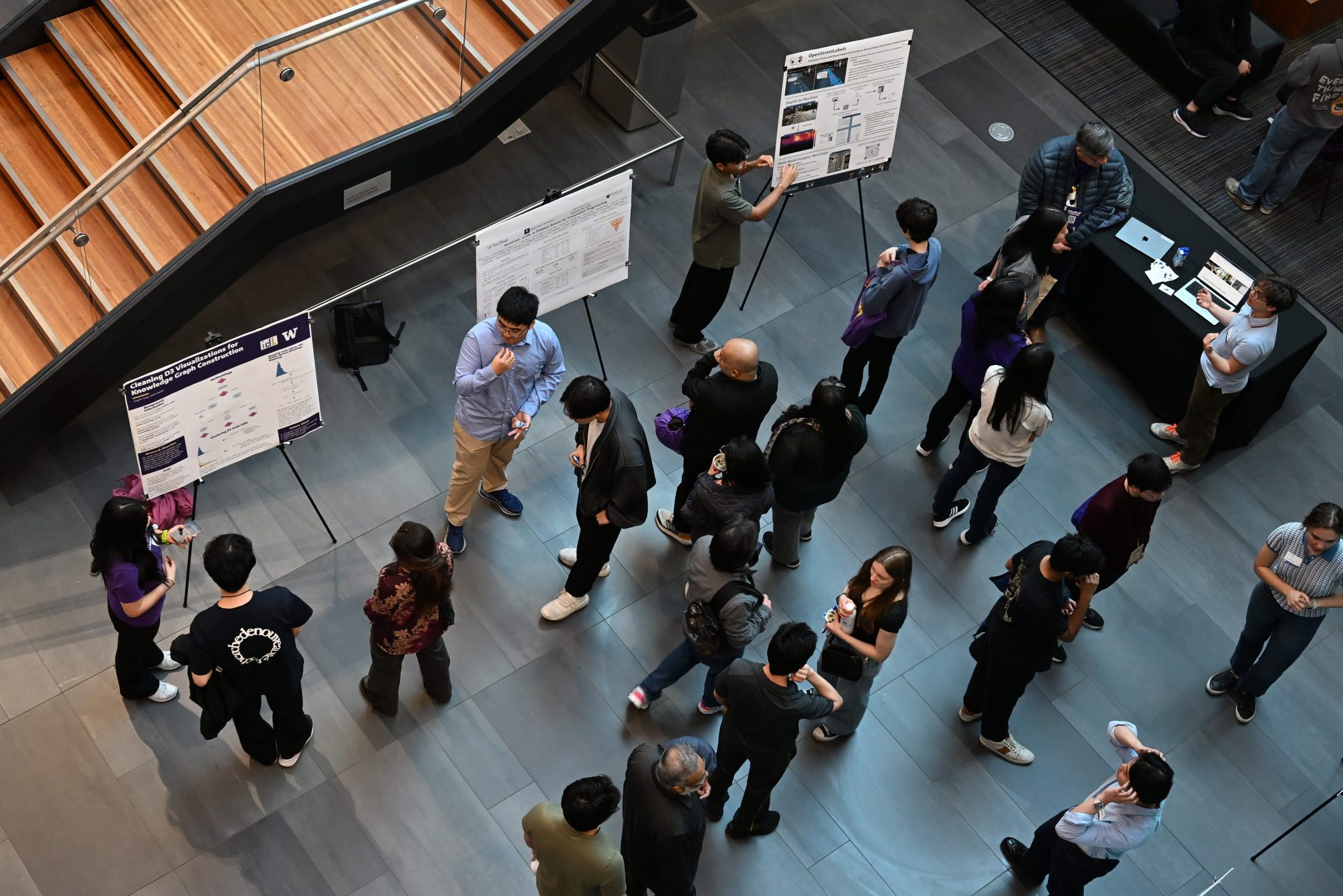 Undergraduate students share research posters during an Undergraduate Research Spotlight