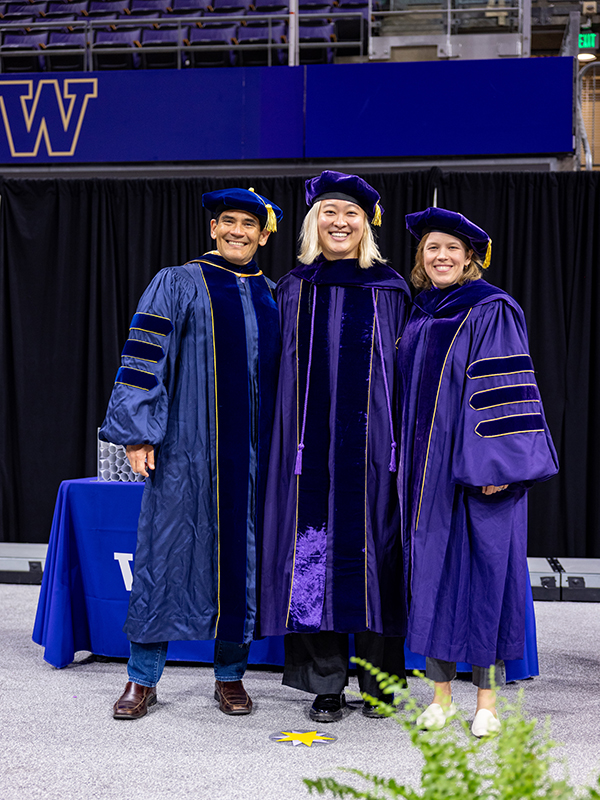 At her Ph.D. graduation, Miranda Wei (center) poses with advisors Tadayoshi Kohno (left) and Franziska Roesner (right).
