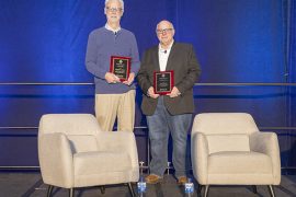 Allen School professor emeritus Richard Ladner holds the SIGCSE Award for Outstanding Contribution to Computer Science Education next to Paul Tymann, faculty at the Rochester Institute of Technology, who received the SIGCSE Award for Distinguished Service to the Computer Science Education Community.