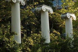 Three columns among the trees in the Sylvan Grove.