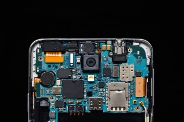 Internal components of a mobile phone against a black background