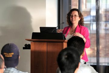 Magda Balazinska speaks at a podium